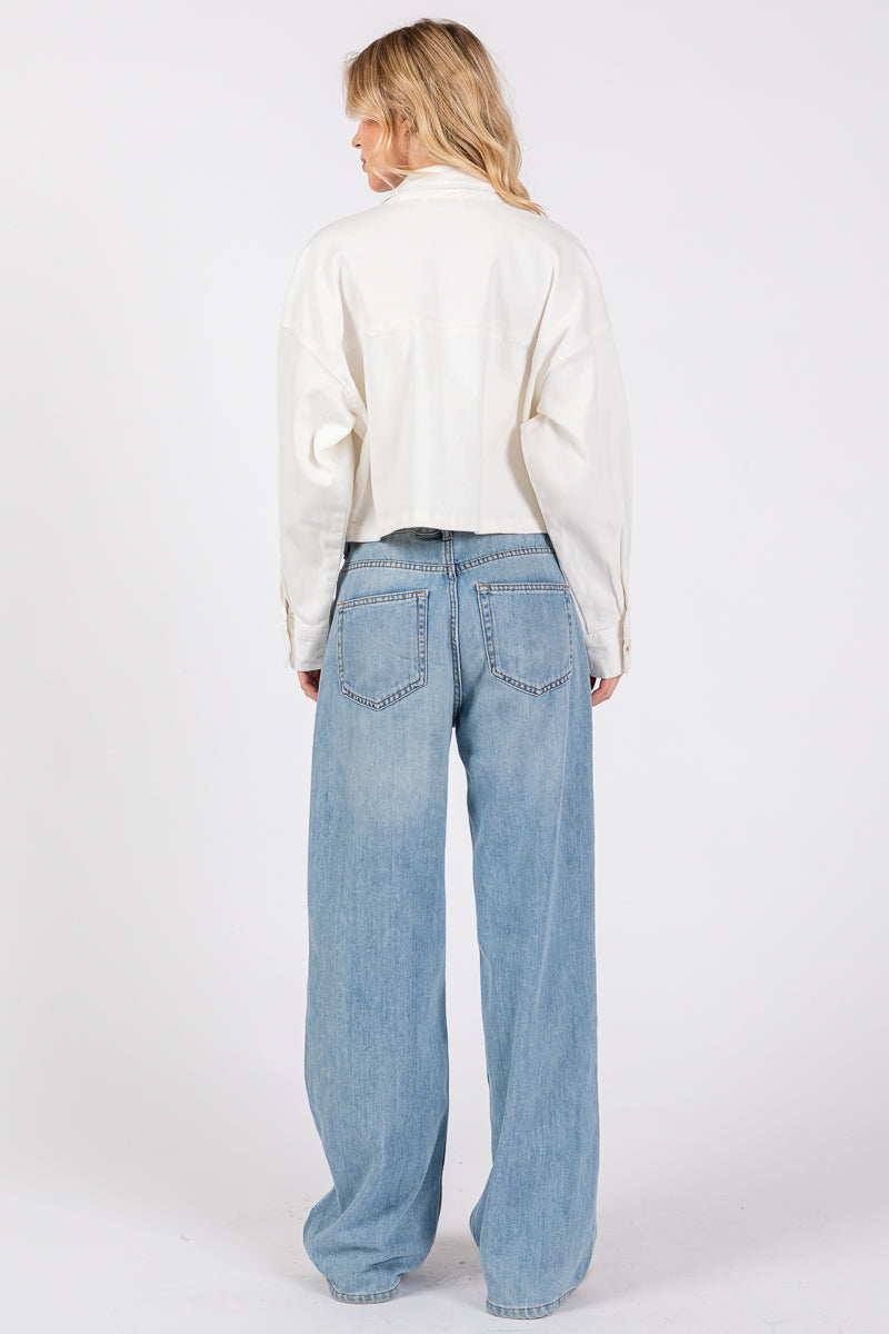 Cropped denim-style jacket with button-down front and wide-leg jeans, shown from the back.